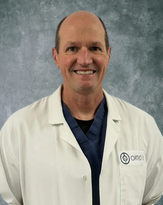 Dr. Pallia w Background